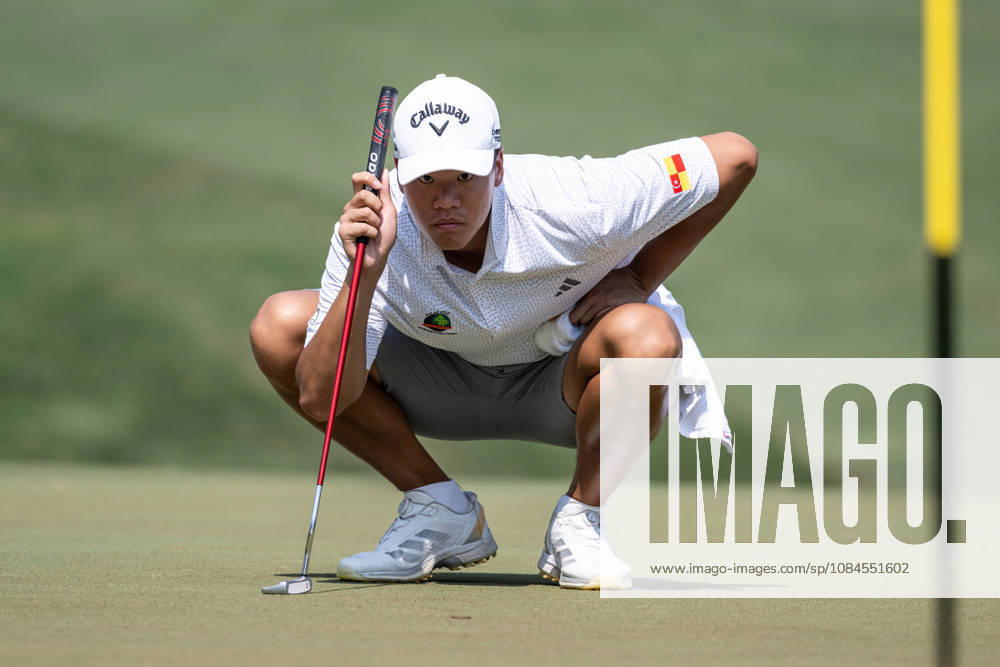 Marcus LIM from Malaysia finishing his round on the 9th green. Opening Round in the Macao Open Golf at Macau Golf & Country Club. Macau Open Golf Rd 1 - ZUMAr144 20261015_zap_r144_169