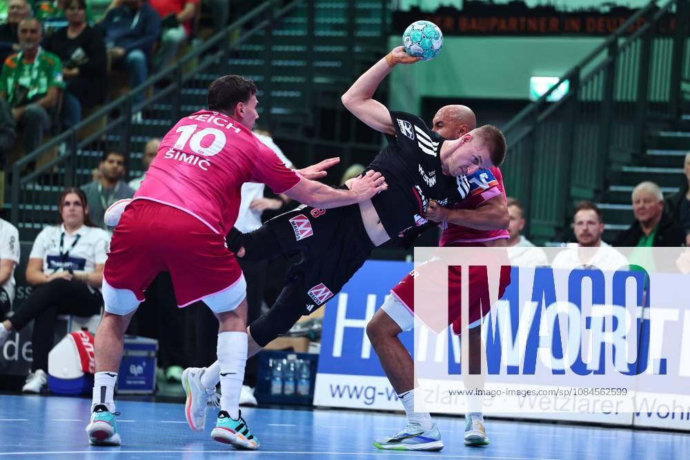 Sander Andreassen Oeverjordet of HC Erlangen, No. 08, in a one-on-one battle with Josip Simic of HSG Wetzlar (left) and David Cyrill Akakpo of HSG Wetzlar GER, HSG Wetzlar vs. HC Erlangen, Handball, Opel Handball Bundesliga, Matchday 9, 2026–2027 season, October 15, 2026, GER, HSG Wetzlar vs. HC Erlangen, Handball, Opel Handball Bundesliga, Matchday 9, 2026–2027 season, October 15, 2026, Wetzlar