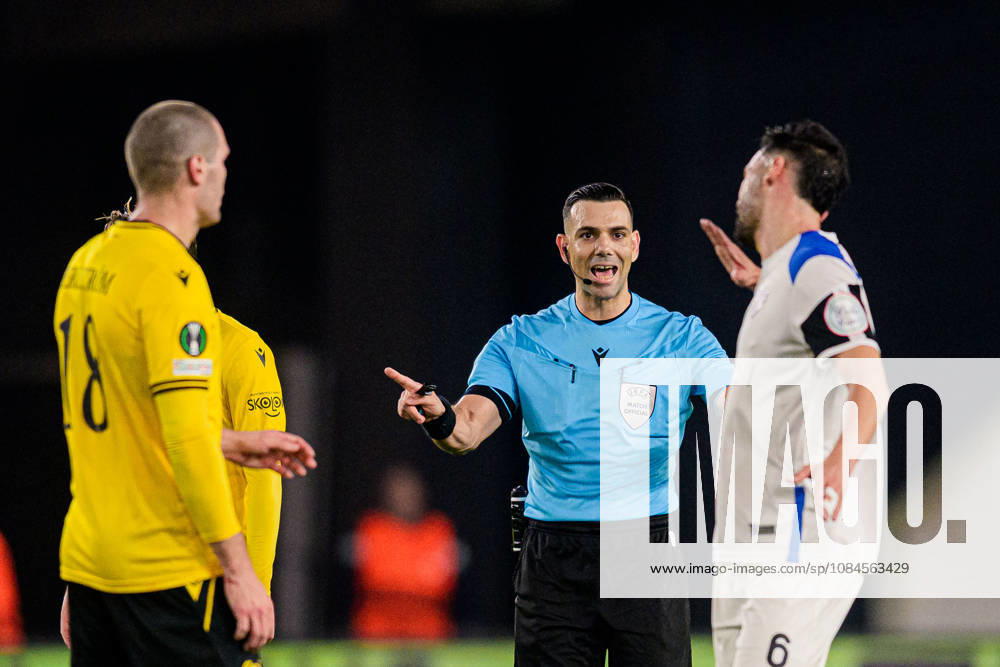 Jacob Bergström of Mjällby, referee Antoniou Menelaus, and Victor Alonso of Inter Club d Escaldes during the UEFA Conference League soccer match between Mjällby and Inter Club d Escaldes on October 15, 2026 in Helsingborg. Photo by Christoffer Borg Mattisson, BILDBYRÅN COP 261 CB0562 soccer football fotball UEFA Conference League Conference League Mjällby in BBENG soccer football fotball UEFA Conference League Conference League Mjällby in BBENG