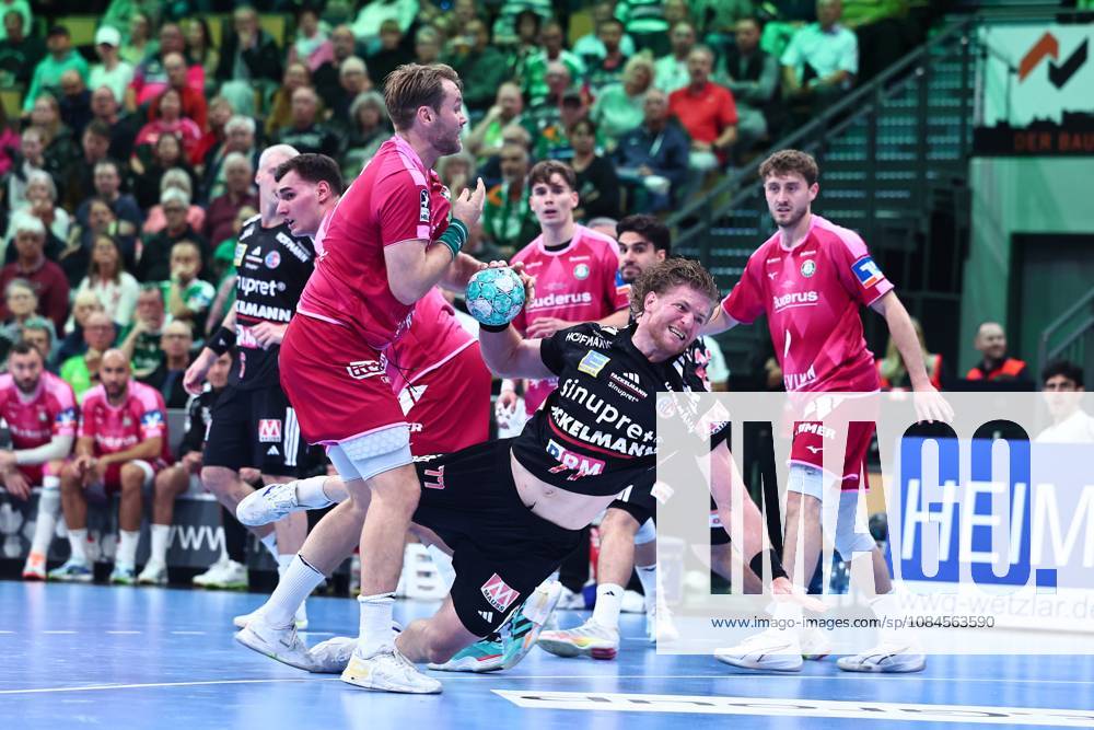 Maciej Gebala (HC Erlangen, No. 77) in a one-on-one battle with Petter Oeverby (HSG Wetzlar), left (GER), HSG Wetzlar vs. HC Erlangen, handball, Opel Handball Bundesliga, Matchday 9, 2026–2027 season, October 15, 2026, GER, HSG Wetzlar vs. HC Erlangen, Handball, Opel Handball Bundesliga, Matchday 9, 2026–2027 season, October 15, 2026, Wetzlar
