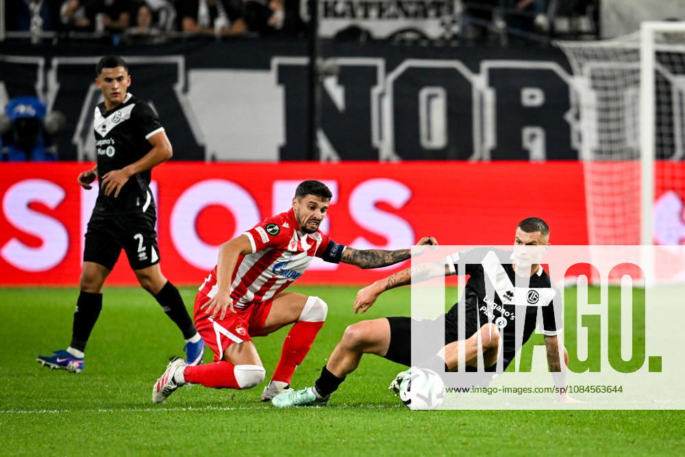 LUGANO, SWITZERLAND OCTOBER 15 Rade Krunic of FK Crvena Zvezda and Lars Lukas Mai of FC Lugano battle for the ball during the UEFA Conference League 2026–27 League Phase Matchday 1 game between FC Lugano and FK Crvena Zvezda at Lugano Arena on October 15, 2026, in Lugano, Switzerland—Lugano, Lugano Arena, Ticino, Switzerland