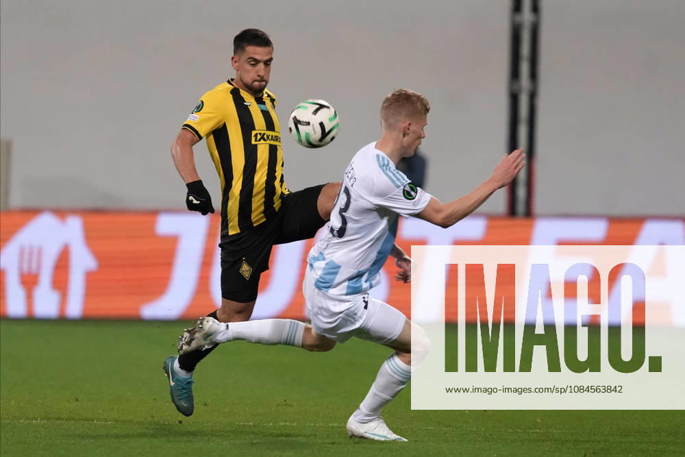 Maksims Tonisevs of Riga FC and Edmilson of Kairat compete for the ball during a UEFA Conference League soccer match between Latvias Riga FC and Kazakhstans Kairat Almaty at Skonto Stadium in Riga, Latvia, Thursday, Oct. 15, 2026. Riga Latvia