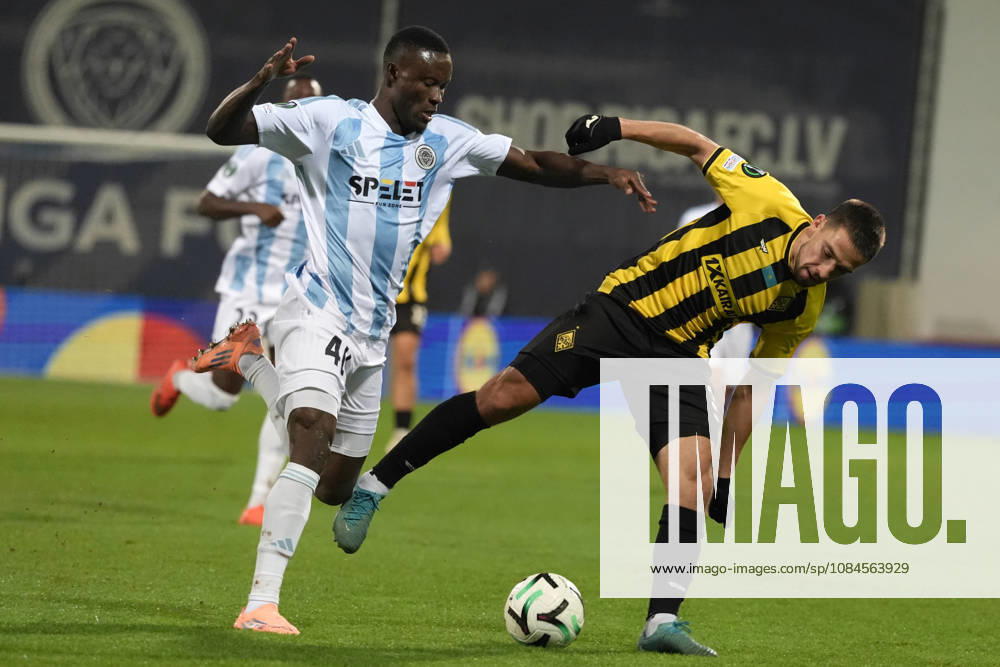 Ahmed Ankrah of Riga FC and Luis Mata of Kairat compete for the ball during a UEFA Conference League soccer match between Latvias Riga FC and Kazakhstans Kairat Almaty at Skonto Stadium in Riga, Latvia, Thursday, Oct. 15, 2026. Riga Latvia
