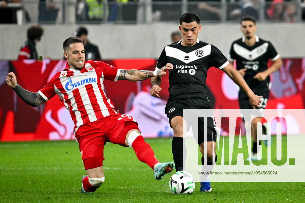 LUGANO, SWITZERLAND OCTOBER 15 Mihailo Ristic of FK Crvena Zvezda and Bekhruz Karimov of FC Lugano battle for the ball during the UEFA Conference League 2026–27 League Phase Matchday 1 match between FC Lugano and FK Crvena Zvezda at Lugano Arena on October 15, 2026, in Lugano, Switzerland—Lugano Arena, Ticino, Switzerland
