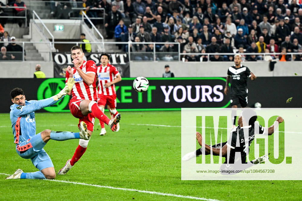LUGANO, SWITZERLAND OCTOBER 15 Dereck Moncada of FC Lugano R scores a goal against goalkeeper Matheus Magalhaes of FK Crvena Zvezda during the UEFA Conference League 2026–27 Group Stage Matchday 1 match between FC Lugano and FK Crvena Zvezda at Lugano Arena on October 15, 2026, in Lugano, Switzerland; Lugano, Lugano Arena, Ticino, Switzerland