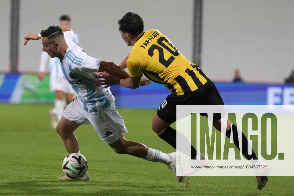 Raki Aouani of Riga FC and Erkin Tapalov of Kairat compete for the ball during a UEFA Conference League soccer match between Latvias Riga FC and Kazakhstans Kairat Almaty at Skonto Stadium in Riga, Latvia, Thursday, Oct. 15, 2026. Riga Latvia