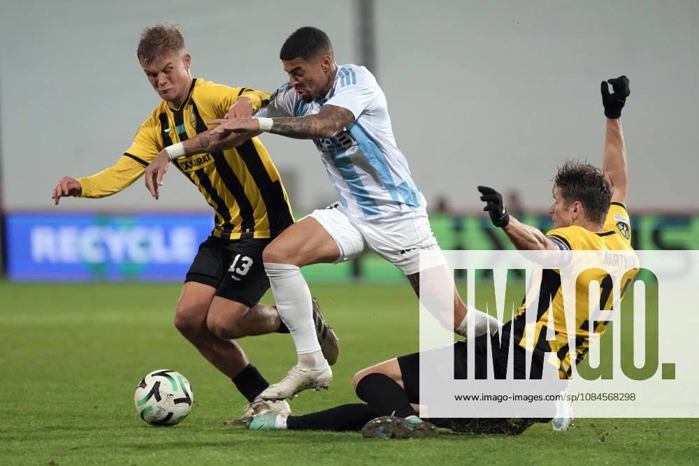 Reginaldo Ramires of Riga FC, centre, Jaakko Oksanen and Aleksandr Martynovich both of Kairat compete for the ball during a UEFA Conference League soccer match between Latvias Riga FC and Kazakhstans Kairat Almaty at Skonto Stadium in Riga, Latvia, Thursday, Oct. 15, 2026. Riga Latvia