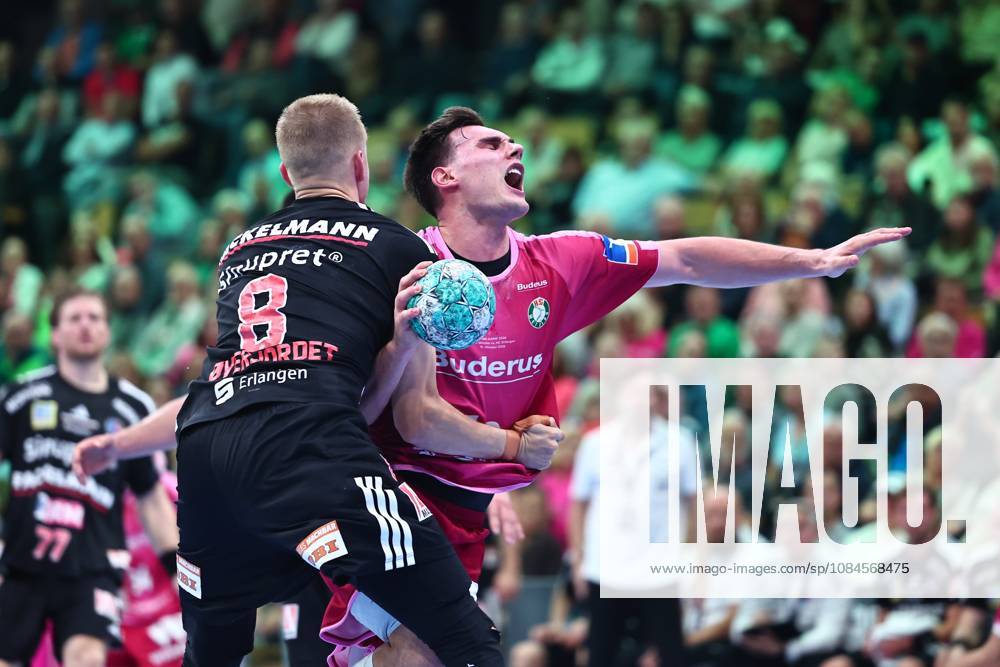 Josip Simic (HSG Wetzlar) in a one-on-one battle with Sander Andreassen Oeverjordet (HC Erlangen), October 8, Germany, HSG Wetzlar vs. HC Erlangen, Handball, Opel Handball Bundesliga, Matchday 9, 2026–2027 season, October 15, 2026, Germany, HSG Wetzlar vs. HC Erlangen, Handball, Opel Handball Bundesliga, Matchday 9, 2026–2027 season, October 15, 2026, Wetzlar