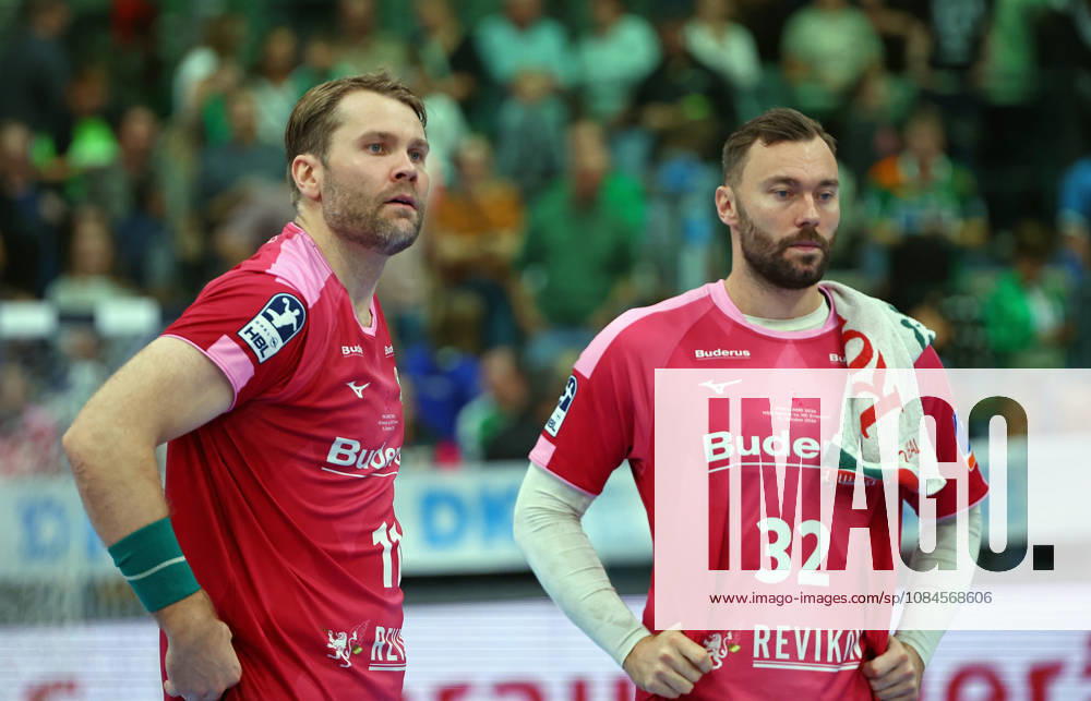 Opel Handball Bundesliga, HSG Wetzlar vs. HC Erlangen: Petter Överby (HSG Wetzlar) and Nikolaj Laesö (HSG Wetzlar) look disappointed after the 30–34 loss to HC Erlangen at the Buderus Arena in Wetzlar, Hesse, Germany DE
