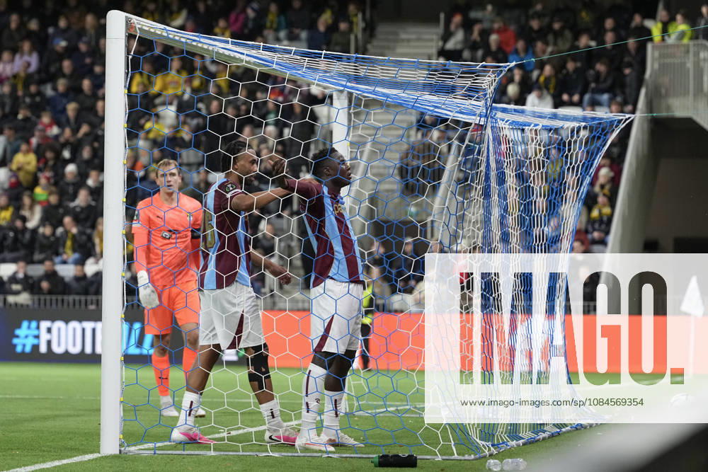 LKS 20261015 KuPS goalkeeper Johannes Kreidl (L) reacts while Trabzonspor players Dju Franculino (R) and Tim Jabol-Folcarelli celebrate the team s fourth goal during the football UEFA Conference League League Phase match between KuPS Kuopio and Trabzonspor in Tampere, Finland, on October 15, 2026. - MIKA KYLMÄNIEMI Tampere Finland JTj-YgqZCic