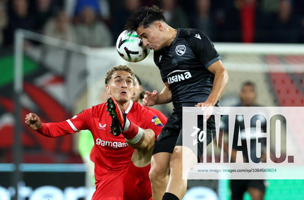 ENSCHEDE FC Twente defender Aske Adelgaard and FC Thun midfielder Nils Reichmuth during the UEFA Conference League match between FC Twente and FC Thun at Grolsch Veste on October 15, 2026, in Enschede, the Netherlands PETER LOUS EYE4IMAGES DeFodi Images