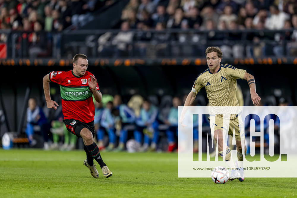NIJMEGEN l NEC Nijmegen midfielder Darko Nejaömic and Levski Sofia midfielder Serginho during the UEFA Europa League match between NEC and Levski Sofia at Stadion De Goffert on October 15, 2026, in Nijmegen, the Netherlands. Photo by DeFodi Images