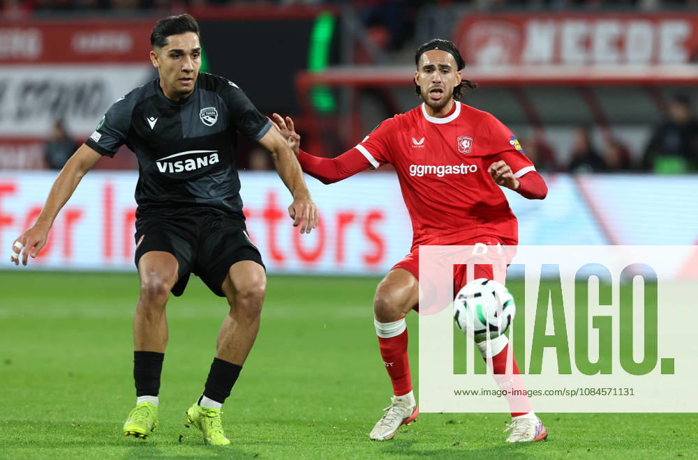 ENSCHEDE FC Thun forward Furkan Dursun with FC Twente midfielder Ramiz Zerrouki during the UEFA Conference League match between FC Twente and FC Thun at Grolsch Veste on October 15, 2026, in Enschede, the Netherlands PETER LOUS EYE4IMAGES DeFodi Images