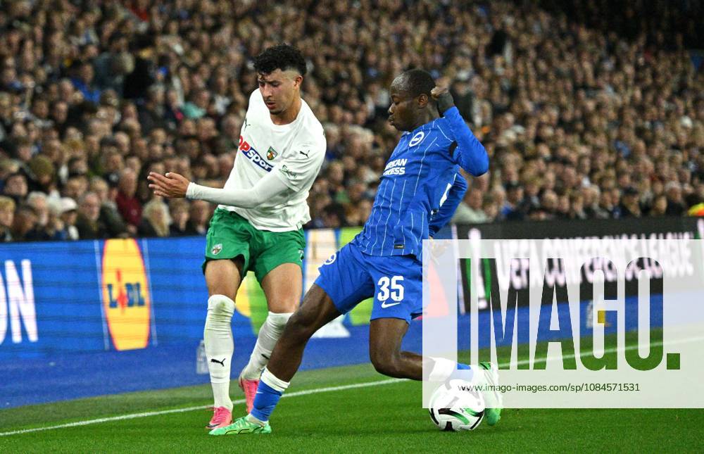 Amine Benchaib of Kauno Zalgiris tries to get past Malick Yalcouye of Brighton during the UEFA Conference League match between Brighton and Hove Albion and Kuano Zalgiris at the American Express Stadium , Brighton , UK - 15th October 2026 Brighton & Hove Albion vs Kuano Zalgiris UEFA Conference League Football, Amex Stadium, Sussex, United Kingdom - 15 Oct 2026Brighton Amex Stadium Sussex United Kingdom Editorial use only. No merchandising. For Football images FA and Premier League restrictions apply inc. no internet mobile usage without FAPL license - for details contact Football Dataco