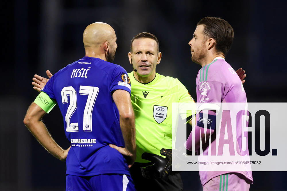 GNK Dinamo v RSC Anderlecht - UEFA Europa League 2026 27 League Phase MD2 Referee Orel Tsvika Grinfeld in conversation with Josip Misic of DInamo Zagreb and Anderlecht Goalkeeper Colin Coosemans during the UEFA Europa League 2026 27 League Phase MD2 match between GNK Dinamo and RSC Anderlecht at Stadion Maksimir on October 15, 2026 in Zagreb, Croatia. JosipxMikacic PIXSELL