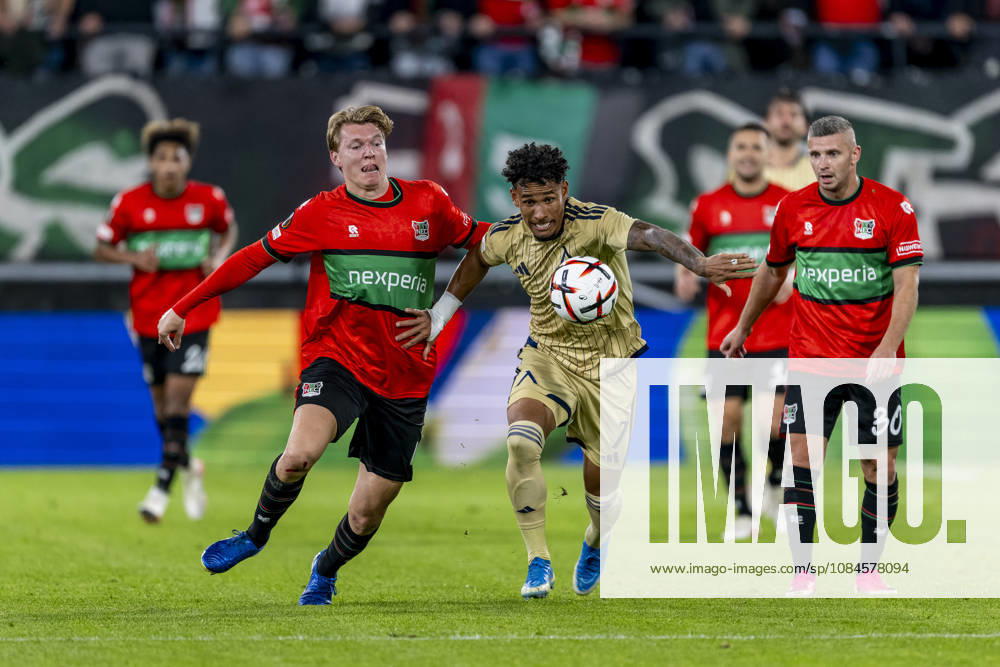 NIJMEGEN l NEC Nijmegen defender Perr Schuurs and Levski Sofia forward Reinaldo during the UEFA Europa League match between NEC and Levski Sofia at Stadion De Goffert on October 15, 2026, in Nijmegen, the Netherlands. Photo by DeFodi Images