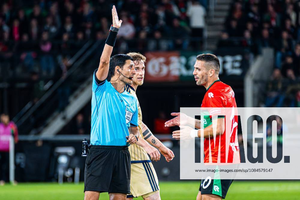 NIJMEGEN - Referee Aliyar Aghayev in conversation with Dusan Tadic of NEC Nijmegen during the UEFA Europa League match between NEC Nijmegen and Levski Sofia at the Goffertstadion on 15 October 2026 in Nijmegen, the Netherlands. KEVIN SENDERS ANP UEFA Europa League 2026 27 ANPxSportx xMarcelxterxBalsxIVx 572569345 originalFilename: 572569345