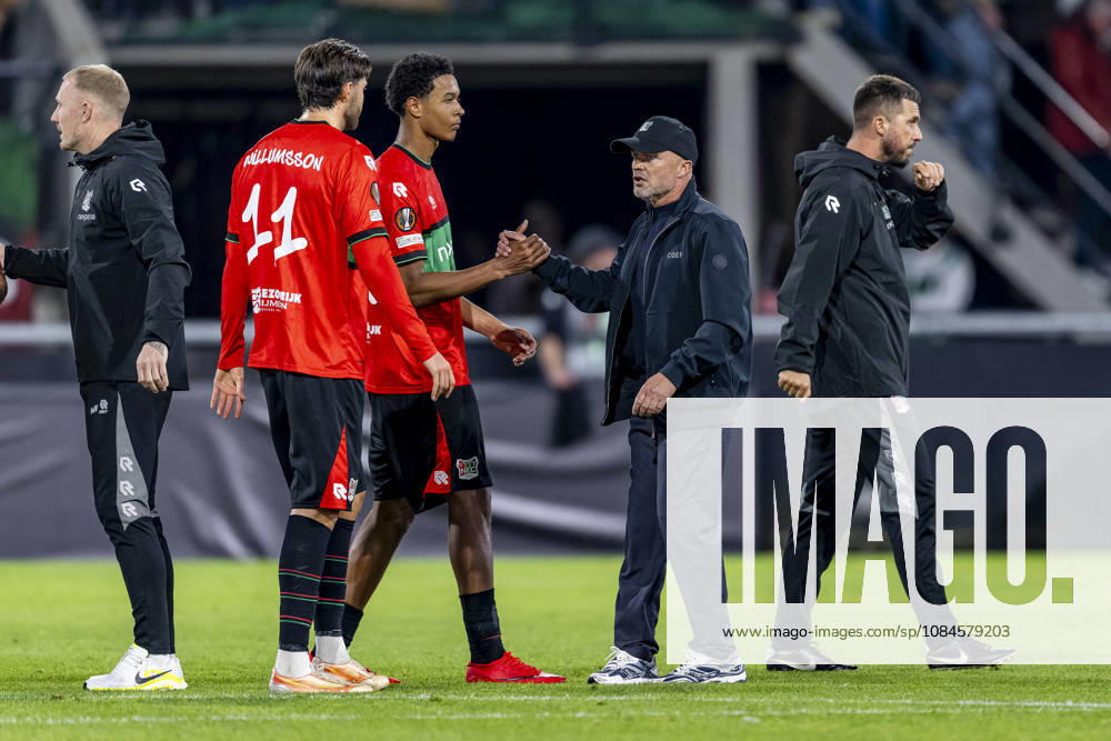 NIJMEGEN l NEC Nijmegen midfielder Willum Thor Willumsson, NEC Nijmegen defender Deveron Fonville, and NEC Nijmegen coach Dick Schreuder during the UEFA Europa League match between NEC and Levski Sofia at Stadion De Goffert on October 15, 2026, in Nijmegen, the Netherlands. Photo by DeFodi Images