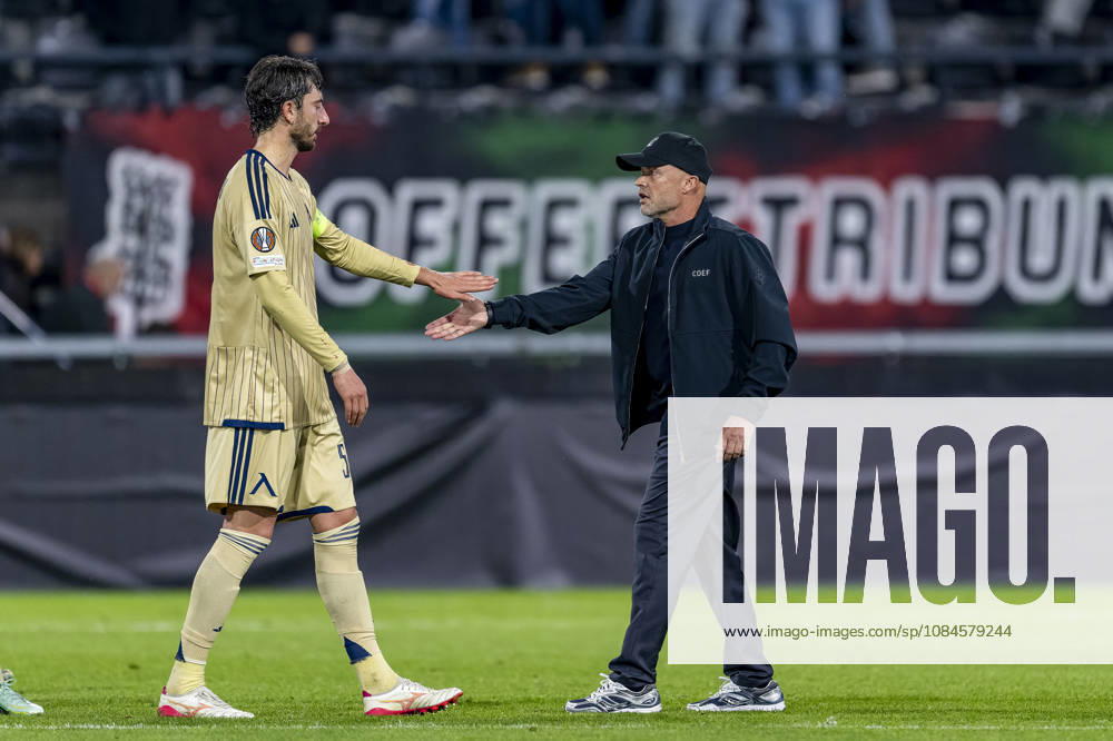 NIJMEGEN l Levski Sofia defender Kristian Dimitrov and NEC Nijmegen coach Dick Schreuder during the UEFA Europa League match between NEC and Levski Sofia at Stadion De Goffert on October 15, 2026, in Nijmegen, the Netherlands. Photo by DeFodi Images