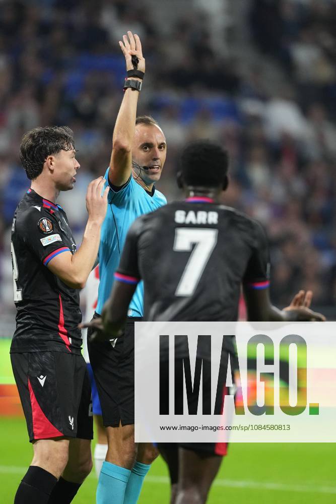 Ismalia Sarr of Crystal Palace is unable to believe he has been given a yellow card for handball by referee Joao Pedro Silva Pinheiro when he clearly headed the ball Lyon v Crystal Palace, UEFA Europa League, Football, Groupama Stadium, Lyon, France - 15 Oct 2026Lyon Groupama Stadium France