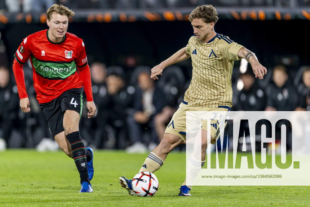 NIJMEGEN l NEC Nijmegen defender Perr Schuurs and Levski Sofia midfielder Serginho during the UEFA Europa League match between NEC and Levski Sofia at Stadion De Goffert on October 15, 2026, in Nijmegen, the Netherlands. Photo by DeFodi Images