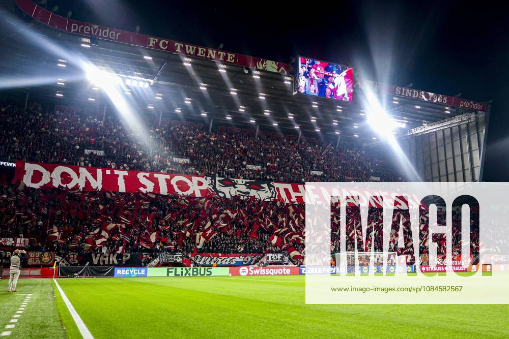 ENSCHEDE - Supporters display a banner and wave flags ahead of the UEFA Conference League match between FC Twente and FC Thun at De Grolsch Veste on October 15, 2026, in Enschede, the Netherlands. WART BRINKERHOF ANP UEFA Conference League 2026 27 ANPxSportx xMarcelxterxBalsxIVx 572579896 originalFilename: 572579896