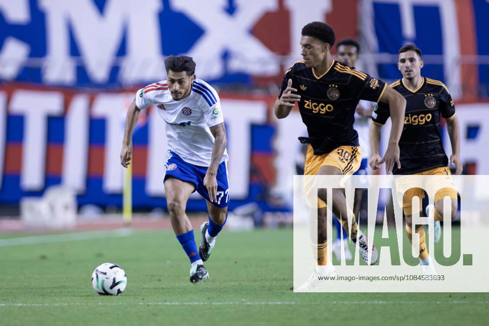 Carlos Martin (HNK HAjduk) 77 and Aaron Bouwman (AFC Ajax) 30 in action during the UEFA Conference League match between HNK Hajduk Split (CRO) and AFC Ajax Amsterdam (NL) at Poljud Stadium. UEFA Conference League: HNK Hajduk Split Vs AFC Ajax Amsterdam 2:1 - ZUMAp210 20261015_zsp_p210_047