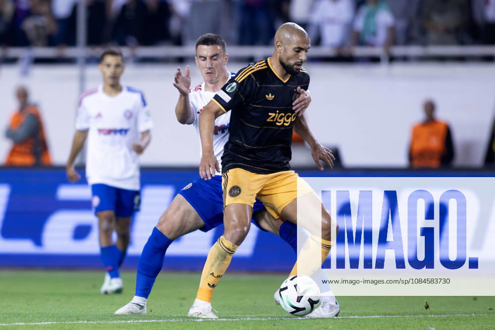 Sofyan Amrabat (AFC Ajax) 4 and Michele Sego (HNK Hajduk) in action during he UEFA Conference League match between HNK Hajduk Split (CRO) and AFC Ajax Amsterdam (NL) at Poljud Stadium. UEFA Conference League: HNK Hajduk Split Vs AFC Ajax Amsterdam 2:1 - ZUMAp210 20261015_zsp_p210_049