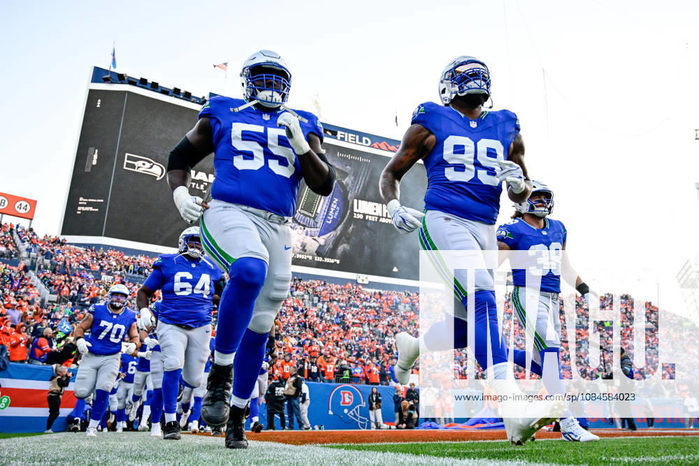 DENVER, CO - OCTOBER 15: Seattle Seahawks players including center Olu Oluwatimi (55) and defensive tackle Leonard Williams (99) take the field before a game between the Seattle Seahawks and the Denver Broncos at Empower Field at Mile High on October 15, 2026 in Denver, Colorado. (Photo by Dustin Bradford Icon Sportswire) NFL, American Football Herren, USA OCT 15 Seahawks at Broncos Icon132261015005