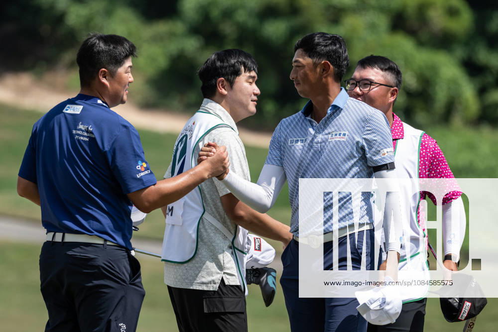 Sungjae IM from Korea (L) is congratulated on coming in -13 par by WANG Wei-hsuan from Taiwan(R) finishes -10par to rank 2nd.Round 2 in the Macao Open Golf at Macau Golf & Country Club. Macau Open Golf Round 2 - ZUMAr144 20261016_zap_r144_084