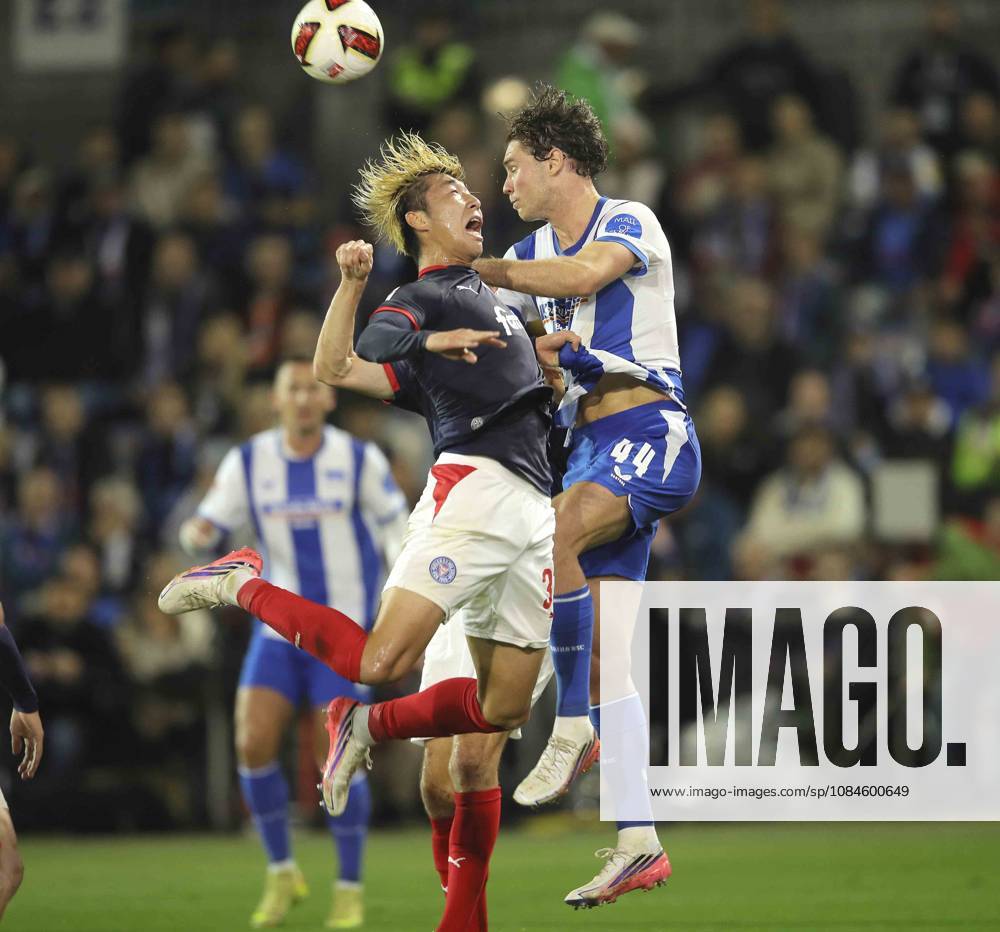 Photo: Hiroki SEKINE of Kiel heads the ball against Linus Gechter. Hertha Soccer, 2. Bundesliga, Matchday 2 on Fri, Oct 16, 2026. Holstein Kiel vs. Hertha BSC