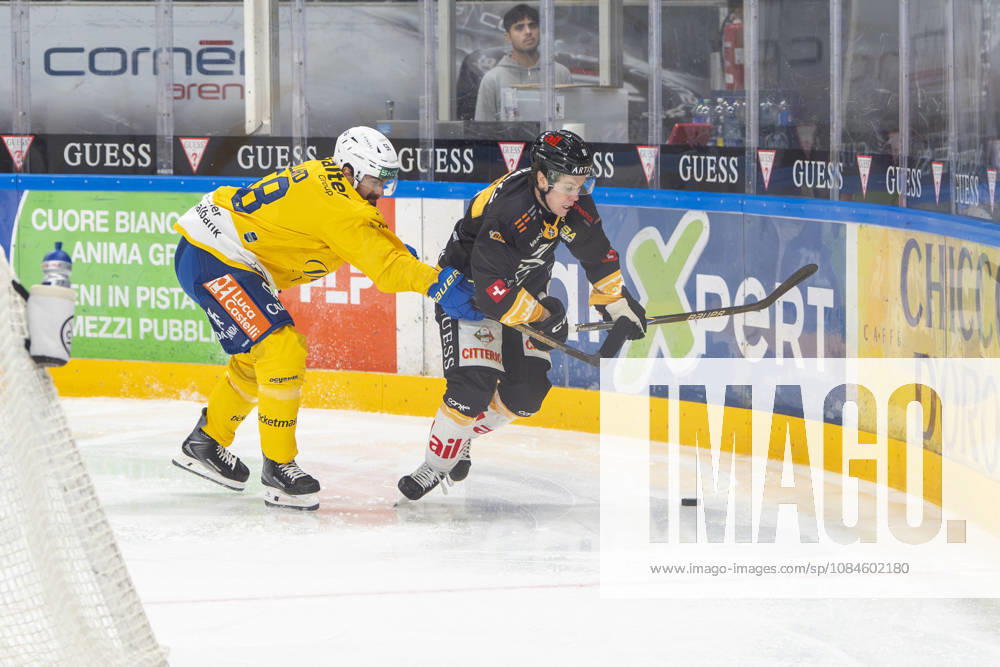 LUGANO, SWITZERLAND, OCTOBER 16: Frederic Allard of Davos (L) faces off against Daniel Olsson of Lugano (R) during the game between HC Lugano and HC Davos at the Corner Arena on October 16, 2026, in Lugano, Switzerland (Ticino, Switzerland)