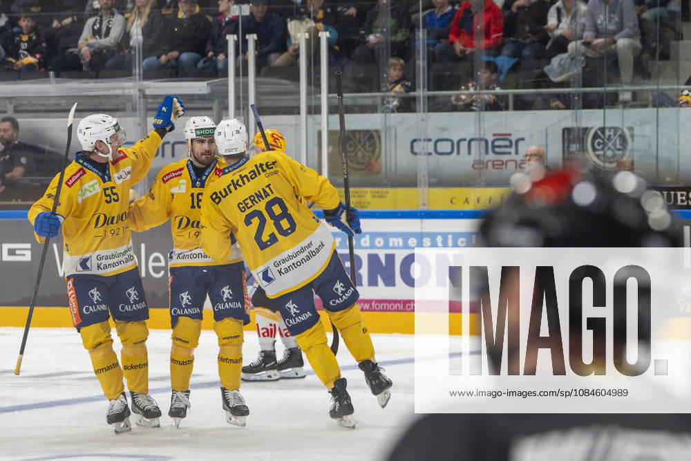 LUGANO, SWITZERLAND, OCTOBER 16: Filip Zadina of Davos (2nd from left) celebrates his goal during the game between HC Lugano and HC Davos at the Corner Arena on October 16, 2026, in Lugano, Switzerland. Lugano, Ticino, Switzerland