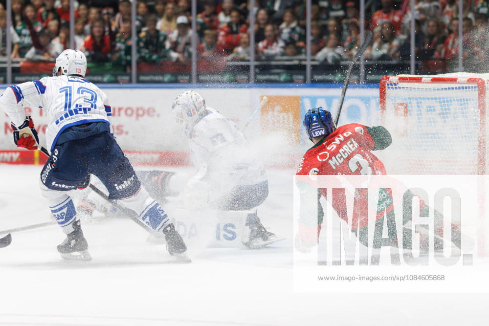 Brooks Macek 13, Adler Mannheim; Jake Hildebrand 30, Adler Mannheim; and Alec McCrea 3, Augsburger Panther, during the game between the Augsburger Panther and Adler Mannheim, ice hockey, men s, DEL, 2026–2027, Matchday 9 on October 16, 2026, in Augsburg, Curt Frenzel Stadium, Bavaria, Germany