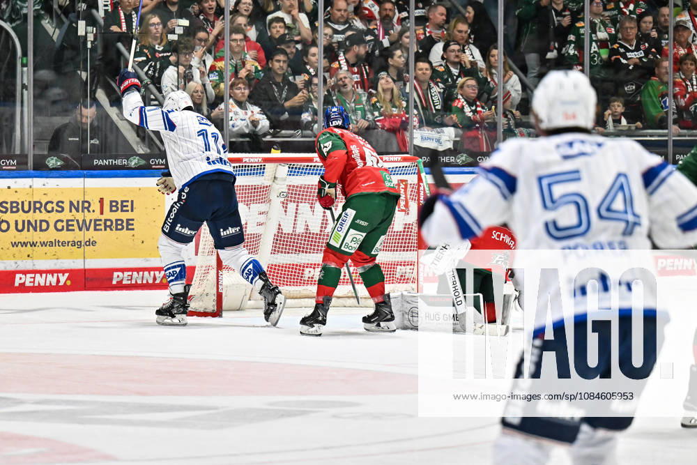Penny DEL: Augsburger Panther vs. Adler Mannheim, October 16, 2026, Augsburg, GERMANY, OCTOBER 16: The visiting fans cheer after Brooks MACEK scores to make it 1–3. Adler Mannheim, 13th goal; the goal scorer is happy during the Penny DEL match between the Augsburger Panther and Adler Mannheim on Matchday 9 at Curt Frenzel Stadium.