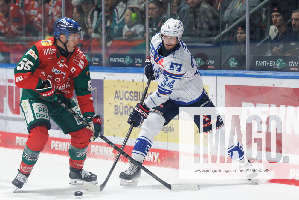 Tom Kühnhackl (34), Adler Mannheim, and Ryan Button (55), Augsburger Panther, during the game between the Augsburger Panther and Adler Mannheim, ice hockey, men s, DEL, 2026–2027, Matchday 9 on October 16, 2026, in Augsburg, Curt Frenzel Stadium, Bavaria, Germany
