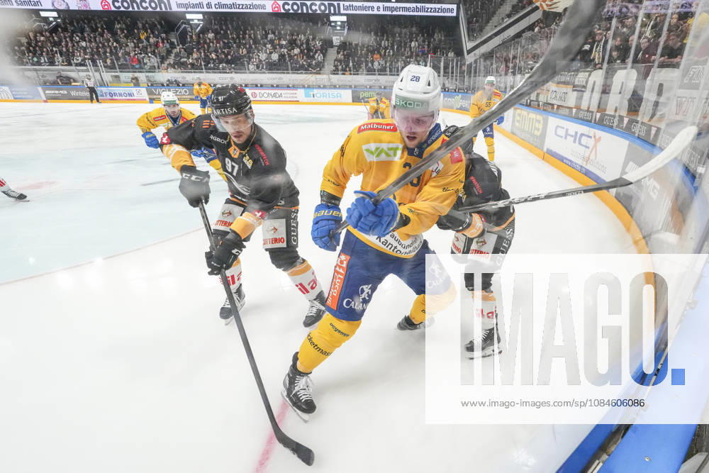 LUGANO, SWITZERLAND OCTOBER 16 Martin Gernat of Davos (C) against Calvin Thurkauf of Lugano (L) and Ramon Tanner of Lugano (R) during the game between HC Lugano and HC Davos at the Corner Arena on October 16, 2026, in Lugano, Switzerland. Lugano, Ticino, Switzerland