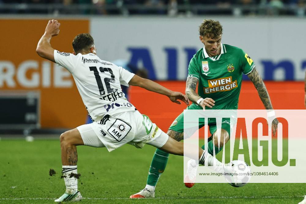 Austrian Bundesliga 2026 27 matchday 9 match between SK Rapid Wien and TSV Hartberg at Allianz Stadion on October 16, 2026 in Vienna, Austria. VIENNA, AUSTRIA - OCTOBER 16: Manuel Pfeifer of Hartberg and Bendeguz Bolla of Rapid Wien in one on one during the Austrian Bundesliga 2026 27 matchday 9 round between SK Rapid Wien and TSV Hartberg at Allianz Stadion on October 16, 2026 in Vienna, Austria. VIENNA VIENNA, AUSTRIA Allianz Stadion SK Rapid Wien Allianz Stadion AUSTRIA