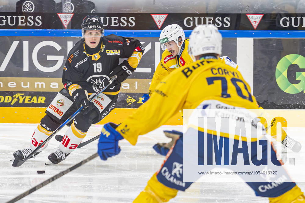 LUGANO, SWITZERLAND, OCTOBER 16: Rasmus Kupari of Lugano (L) faces off against Yannick Frehner of Davos (C) during the game between HC Lugano and HC Davos at the Corner Arena on October 16, 2026, in Lugano, Switzerland; Lugano, Ticino, Switzerland