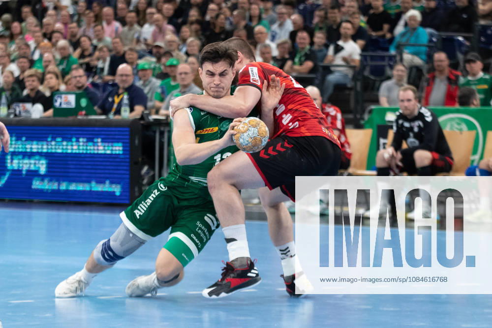 Handball, HBL2: SC DHfK Leipzig vs. ASV Hamm Westfalen, October 16, 2026; Matej Klima 13, SC DHfK Leipzig falls to Jann Keno Jacobs 43, ASV Hamm Westfalen Handball, 2nd Bundesliga, 2026–2027 season, Matchday 8: SC DHfK Leipzig vs. ASV Hamm Westfalen on October 16, 2026, at the Quarterback Immobilien Arena Leipzig