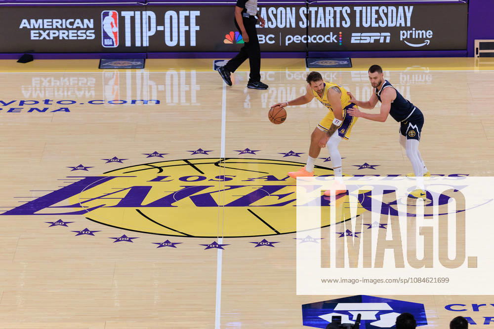 Luka Doncic 77 of the Los Angeles Lakers is guarded by Christian Braun 0 of the Denver Nuggets during a preseason NBA, Basketball Herren, USA game on Friday, October 16, 2026, at Crypto.com Arena in Los Angeles, California. JAVIER ROJAS PI Lakers Vs. Nuggets - Preseason - ZUMAp124 20261016_zaa_p124_007