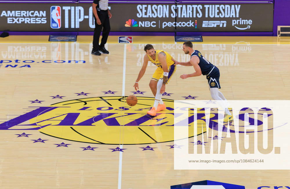 Luka Doncic 77 of the Los Angeles Lakers is defended by Christian Braun 0 of the Denver Nuggets during a preseason NBA, Basketball Herren, USA game on Friday October 16, 2026 at Crypto.com Arena in Los Angeles, California. Lakers lose to Nuggets, 106-121. JAVIER ROJAS PI Lakers Vs. Nuggets - Preseason - ZUMAp124 20261016_zaa_p124_045