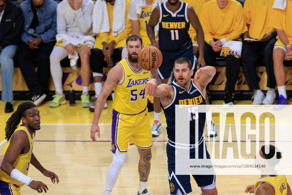 Nikola Jokic 15 of the Denver Nuggets passes the ball during a preseason NBA, Basketball Herren, USA game against the Denver Nuggets on Friday October 16, 2026 at Crypto.com Arena in Los Angeles, California. Lakers lose to Nuggets, 106-121. JAVIER ROJAS PI Lakers Vs. Nuggets - Preseason - ZUMAp124 20261016_zaa_p124_051