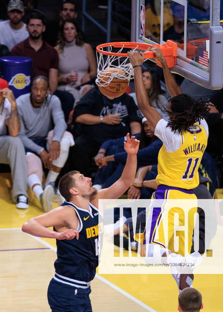 Ziaire Williams 11 of the Los Angeles Lakers dunks the ball over Nikola Jokic 15 of the Denver Nuggets during a preseason NBA, Basketball Herren, USA game on Friday October 16, 2026 at Crypto.com Arena in Los Angeles, California. Lakers lose to Nuggets, 106-121. JAVIER ROJAS PI Lakers Vs. Nuggets - Preseason - ZUMAp124 20261016_zaa_p124_056
