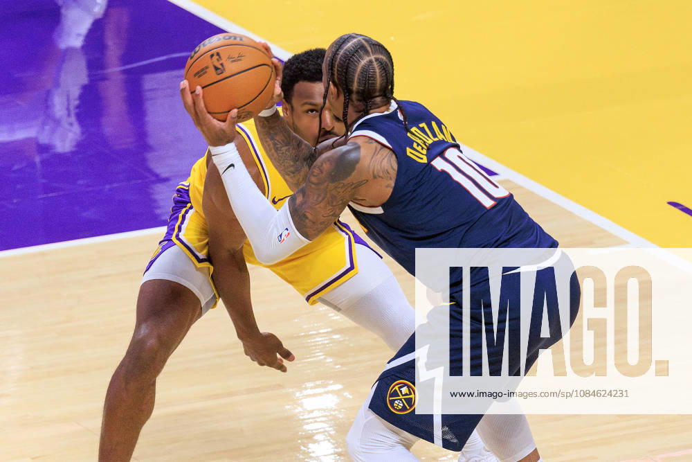 Bronny James 9 of the Los Angeles Lakers defends against DeMar DeRozan 10 of the Denver Nuggets during a preseason NBA, Basketball Herren, USA game on Friday October 16, 2026 at Crypto.com Arena in Los Angeles, California. Lakers lose to Nuggets, 106-121. JAVIER ROJAS PI Lakers Vs. Nuggets - Preseason - ZUMAp124 20261016_zaa_p124_058