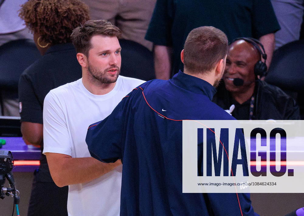 Luka Doncic 77 of the Los Angeles Lakers and Nikola Jokic 15 of the Denver Nuggets interact after a preseason NBA, Basketball Herren, USA game on Friday October 16, 2026 at Crypto.com Arena in Los Angeles, California. Lakers lose to Nuggets, 106-121. JAVIER ROJAS PI Lakers Vs. Nuggets - Preseason - ZUMAp124 20261016_zaa_p124_068