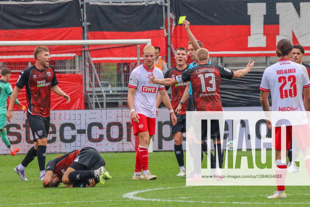 Yellow card for Ben Huening of Rot-Weiss Essen, No. 15, after a foul on Lukas Froede of FC Ingolstadt 04, No. 34, during the match between FC Ingolstadt 04 and Rot-Weiss Essen on October 17, 2026, DFB regulations prohibit any use of photographs as image sequences and or quasi-video. GER, Soccer, 3. Liga, Matchday 10, FC Ingolstadt 04 vs. Rot-Weiss Essen, October 17, 2026, Audi Sportpark Ingolstadt
