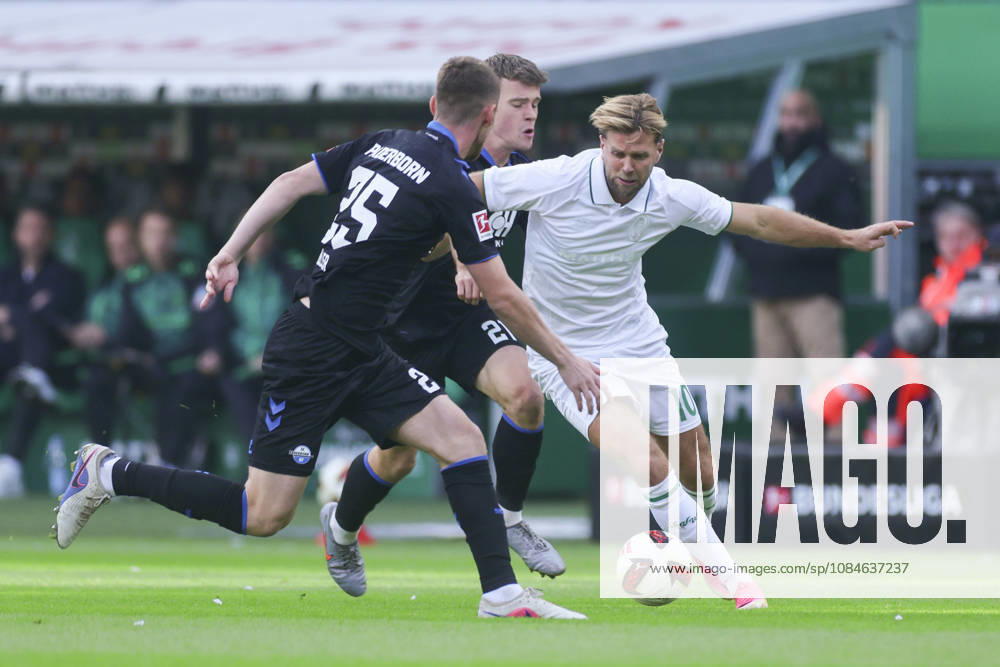Tjark Scheller, SC Paderborn 07, Jano Ter Horst of SC Paderborn 07 and Niclas Fuellkrug of Werder Bremen battle for the ball during the Bundesliga 1 match between SV Werder Bremen and SC Paderborn 07 at Weserstadion on October 17, 2026, in Bremen, Germany. Photo by Marco Steinbrenner, DeFodi Images. Tjark Scheller of SC Paderborn 07, Jano Ter Horst of SC Paderborn 07 and Niclas Fuellkrug of Werder Bremen battle for the ball during the Bundesliga match between SV Werder Bremen and SC Paderborn 07 at Weserstadion on October 17, 2026 in Bremen, Germany. Photo by Marco Steinbrenner, DeFodi Images. DFB and DFL regulations prohibit any use of photographs as image sequences and or quasi-video. Photo by Marco Steinbrenner, DeFodi Images.