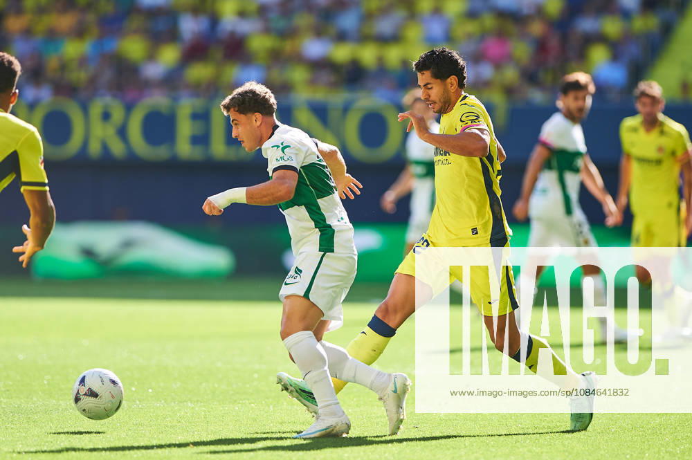 German Valera of Elche CF and Ayoze Pérez of Villarreal CF during the LaLiga EA Sports match between Villarreal CF and Elche CF at Estadio de la Cerámica on October 17, 2026, in Villarreal, Spain