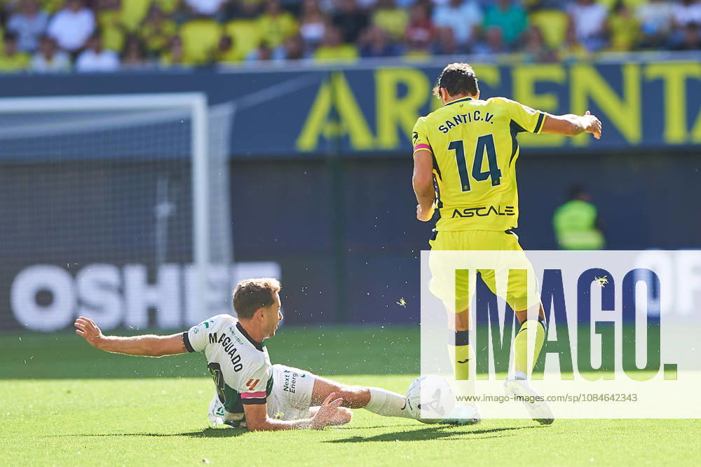 Marc Aguado of Elche CF and Santi Comesana of Villarreal CF during the LaLiga EA Sports match between Villarreal CF and Elche CF at Estadio de la Cerámica on October 17, 2026, in Villarreal, Spain